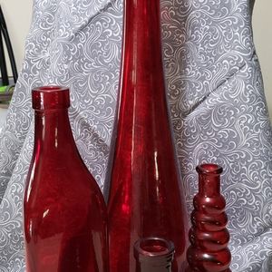 Set of 4 decorative glass bottles